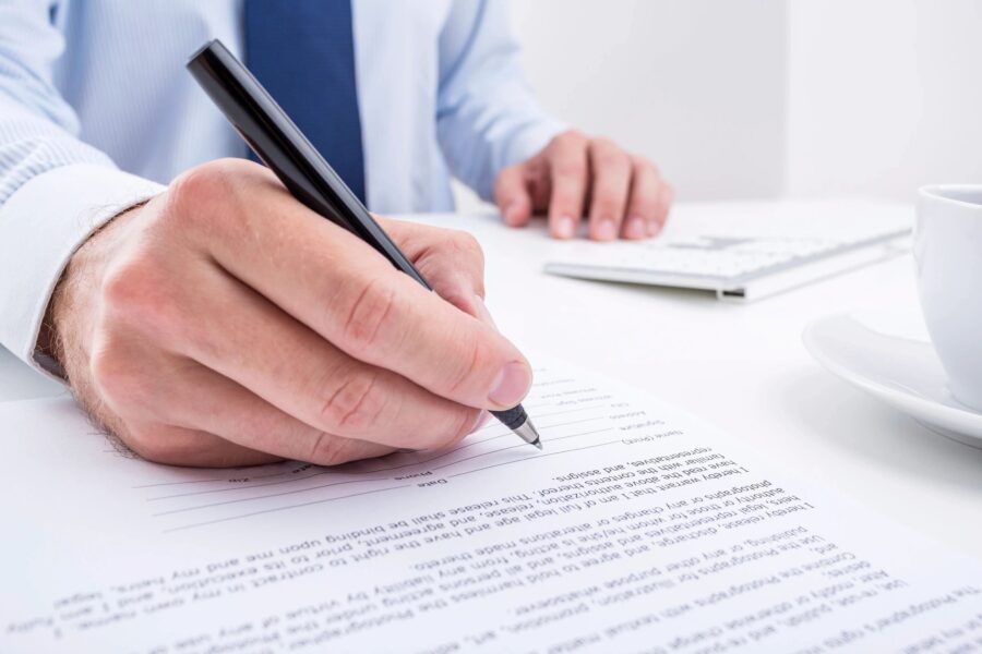 A lawyer writing a contract.